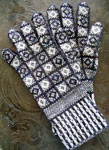 hand knitted gloves made with Malabrigo Sock Yarn  color candombe and natural