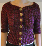 Malabrigo Worsted Yarn, color 204 velvet grapes, short=sleeved cardigan