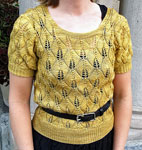 Hand-knit short sleeved pullover sweater made with Malabrigo Merino Sock Yarn color ochre