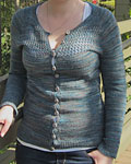 Hand-knit cardigan using Malabrigo Merino Sock Yarn color persia