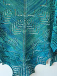 Hand-knit lace scarf/shawl knit with Malabrigo Merino Sock Yarn color solis