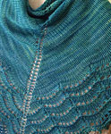 Hand-knit lace scarf/shawl knit with Malabrigo Merino Sock Yarn color solis